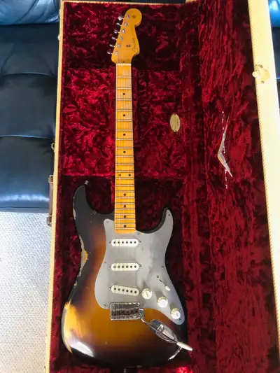 El Diablo strat in sunburst. From a pet-free, non smoking home, comes with original case and case ca...