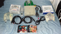 Dreamcast + 5 manettes et 2 jeux