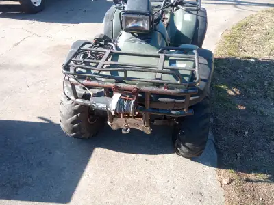 Motor runs good, no smoke, Good running gear, Selling whole ATV,, not parting out, 1999 450 S Best f...