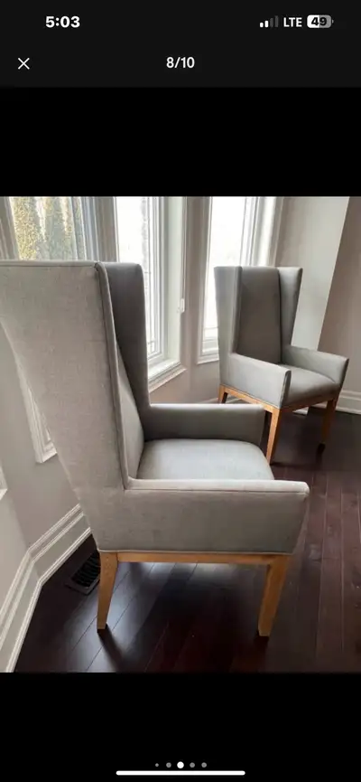 Beautiful original from Restoration hardware 2 arm chairs in light grey with oak wood legs Used but...