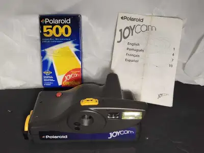 Like new Polaroid Joycam Instant film camera with new box film., View more