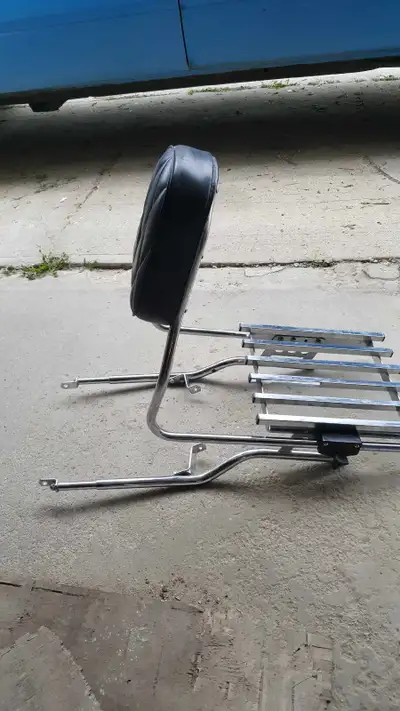 Adjustable backrest and package carrier for motorcycle or atv