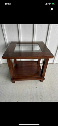 Wooden side table with glass top 