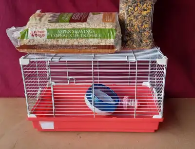 Hamster Cage, exercise wheel, water bottle and seeds,  $20, View more