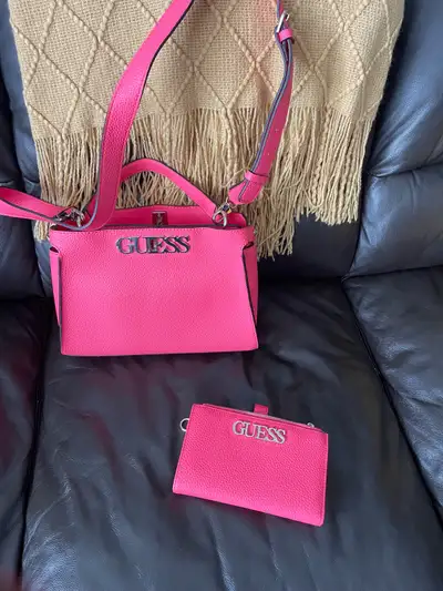 Guess purse with matching wallet. Excellent condition. Asking $50 for both.