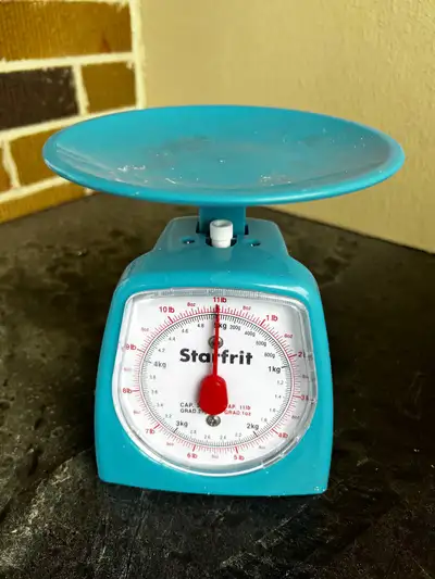 kitchen scale. Measures in kilograms and pounds.