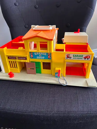 Vintage Fisher PriceVillage. Buildings only. Missing garage doors & traffic light bridgeway.
