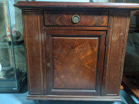 Antique wooden display cabinet with glass top