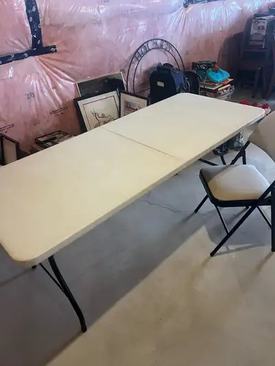 This is a used 6-foot long folding table that's perfect for events, workshops, or as an extra surfac...