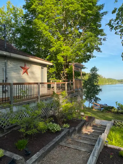 Sandy Bay cottage is situated on Grand Lac Rond (Roddick lake) in Bay du Paul, Bouchette, Quebec. Th...