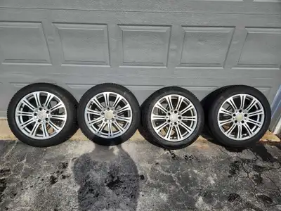 Continental (Viking Contact 7) snow tires currently mounted on RSSW Alloy wheels (5 spoke). Used 2 s...