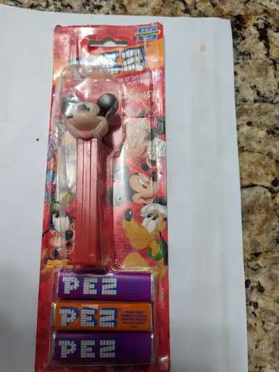 Vintage Mickey Pez dispenser in package, View more