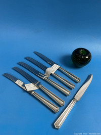 Sterling Silver knives and plates