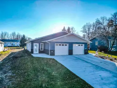 Experience the convenience of one-level living in the charming community of Souris. This thoughtfull...