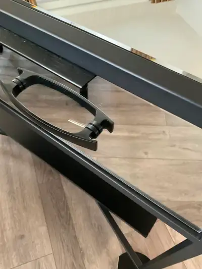 Apartment sized console table mirror finish and black iron construction. Two drawer and one shelf ad...