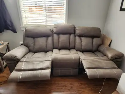 Very clean leather grey couch for sale 250 230 0366