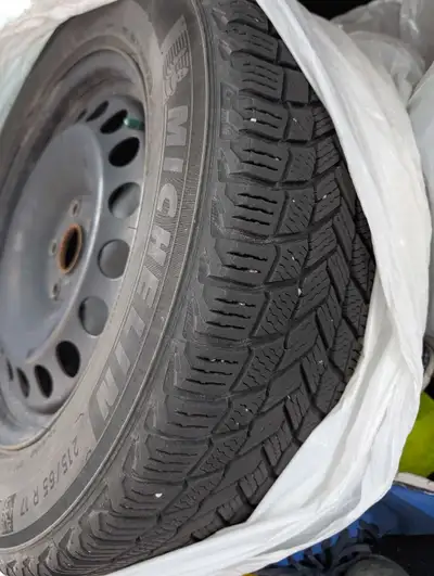 4 sets of Michelle winter tires. Size 215 65/R17 99T. Asking $600. 4 Rims. Asking $400.