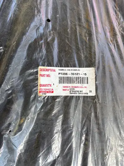 I am selling a set of new genuine Toyota Tacoma C-Cab floor mats, part number PT206-35121-15, still...