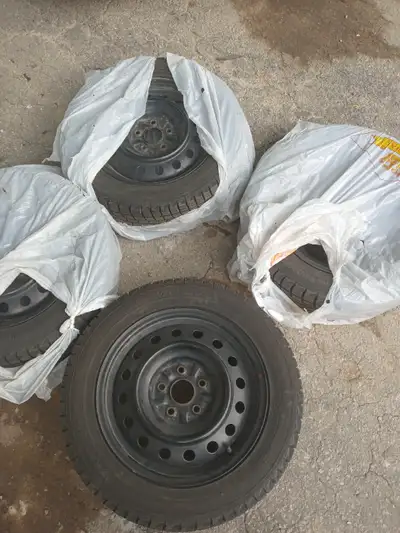 4 - Barely used ! Still like new! Even sticker glue is in the treads! On Steel Rims - Bought for a L...