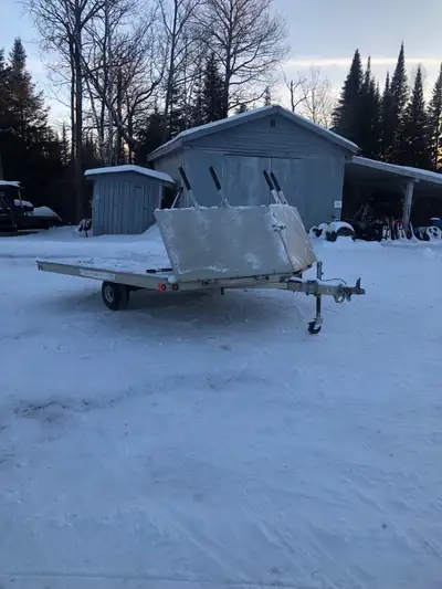 2007 Sledbed Snowmobile trailer 101 inches wide 11 feet plus 2 foot v Drive off front ramps that wor...