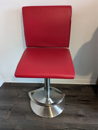 Height adjustable leather bar stool. In excellent condition.