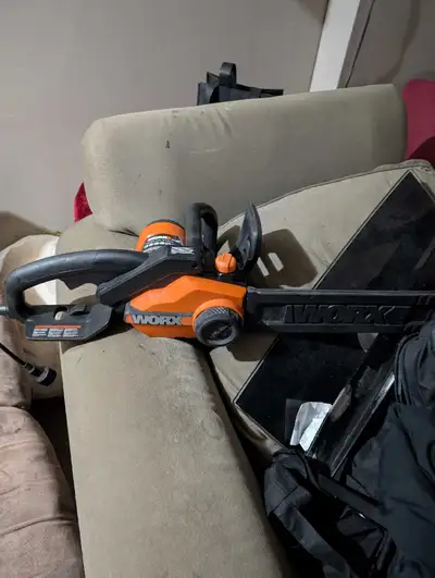 I'm selling a 16" electric chainsaw by worx. Never used,practically still new. A friend owed me mone...
