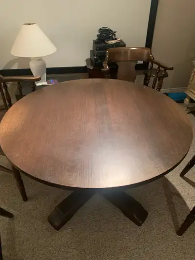 42” solid oak table and chairs. Will sell separately!!! Must go.
