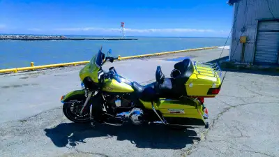 You can have this beautiful low milage Electraglide Ultra Limited with over $4000 in extra s already...