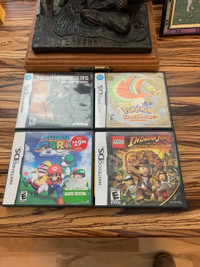 Nintendo DS games, charger and cases