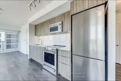 FOR RENT: Bright & Modern 1+1 Condo | 9th Floor | $2,399/month