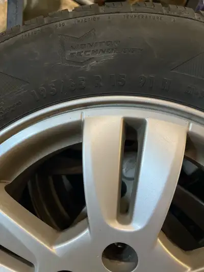 Selling a set of four General Evertrek GT all-season tires mounted on rims, size 195/65R15 91H. Thes...