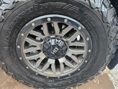 265/70/17 set of 4 on fast hd rims are gun metal grey and black, came of 4runner had one summer on t...