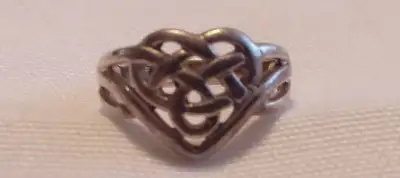 A NICE SIZE 5 RETICULATED HEART SHAPE 925 STERLING SILVER RING IT IS IN PERFECT CONDITION IT CAN BE...