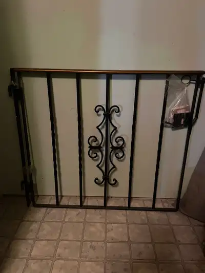 Wrought iron gate custom-made for staircase. 36 x 31”.
