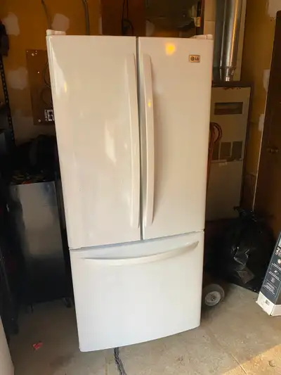 LG Fridge for sale - used condition French doors White Freezer does not work properly. $250 Buyer re...