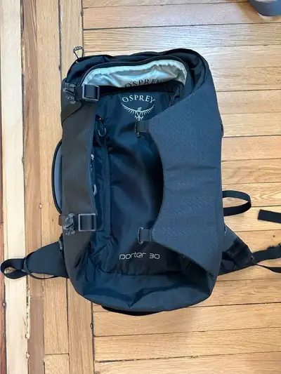 Very minimal travel backpack (30L capacity) and easily fits on low-cost carriers "fit in front of th...
