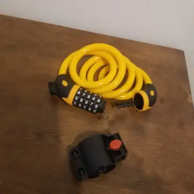 Available in mississauga Keep your bike safe with this combination bike lock, featuring a bright yel...