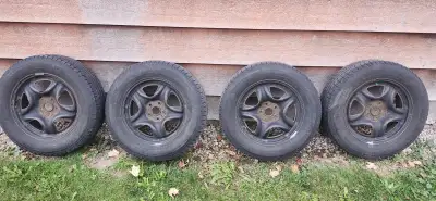 Used set of Michelin ice X 225/65/17 tires on wheels off a RAV4, they have a average of 6mm tread on...