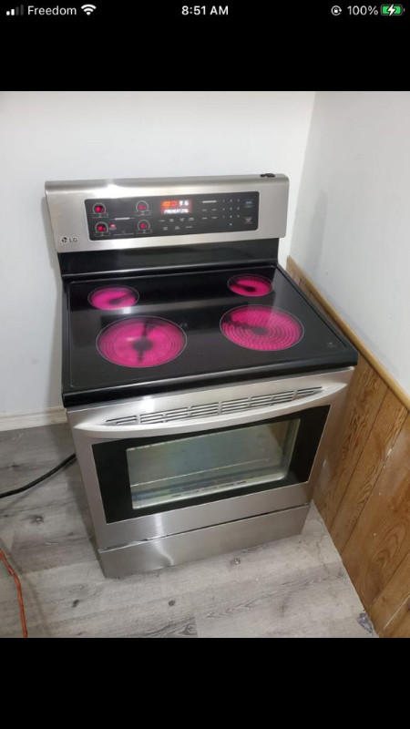 Lg 2 yr old stainless steel 30 w freestanding electric stove for sale  