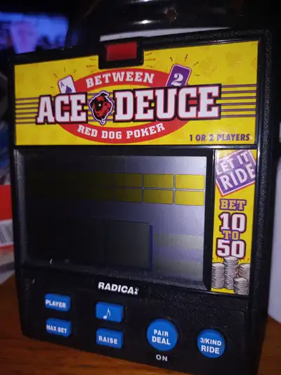 HAND HELD BETWEEN ACE DEUCE RED DOG POKER, View more
