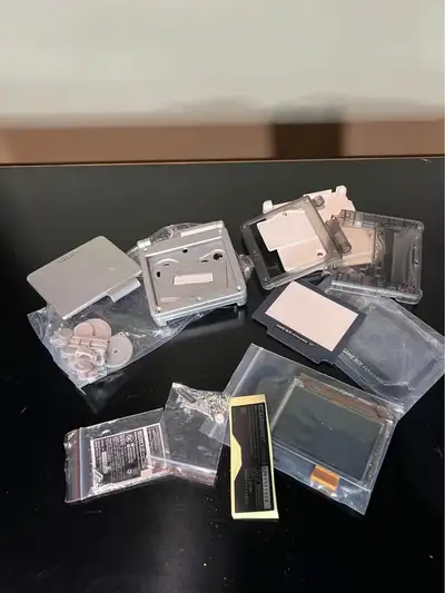 Game Boy Advance SP Replacement Parts Lot - Shells Batteries, View more