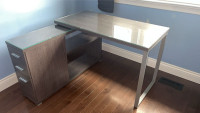 Stylish Grey Wood Tone Laminate Corner Desk with Custom Glass