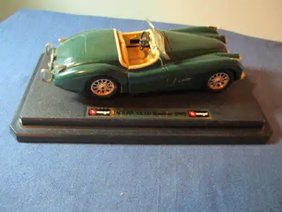 I have owned this neat Burago model many years. In good condition but with cracks on windshield & mi...