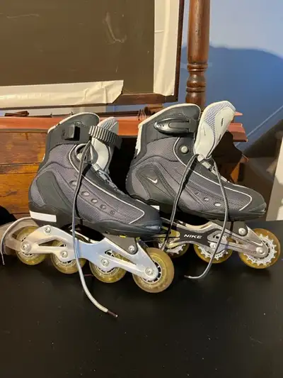Roller Blades Nike women size 7 & pads, View more