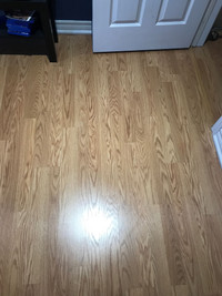 Laminate floor. Looks like real hardwood.