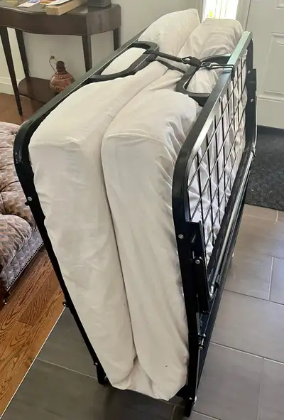Pickup near Bloor/Kipling. Single rollaway cot from a smoke-free home. Clean and ready to use. This...
