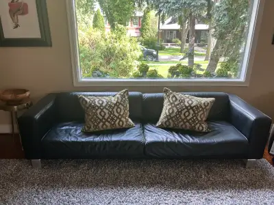 sleek black leather couch, View more