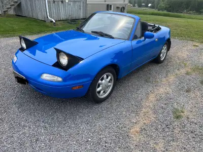 1990 Mazda Miata, excellent to mint condition, never seen snow, always stored inside. Purchased bran...