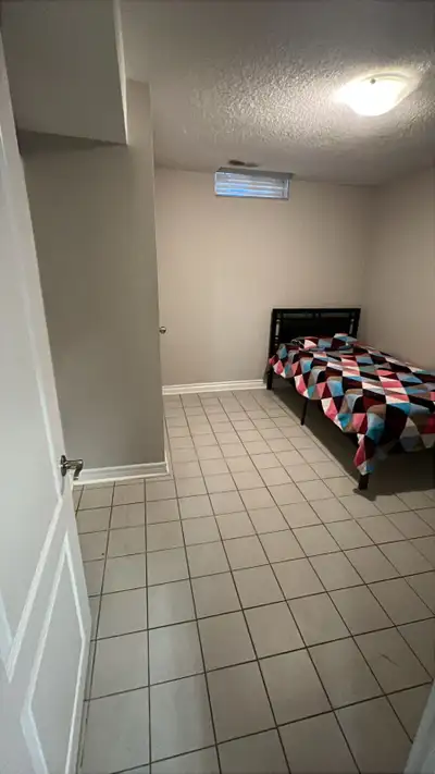 1 bedroom in legal basement apartment, 1 car parking, no carpets, shared common space as living area...