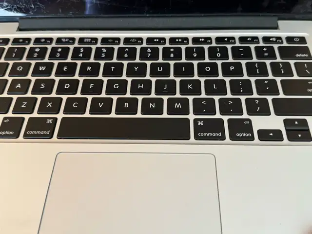 12 top cases with logic boards MacBook Pro models A1502 in Laptops in Edmonton - Image 5